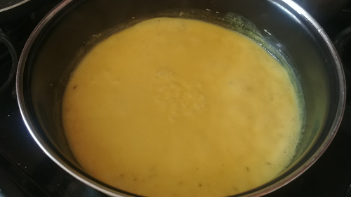 Pour the kadhi mixture into the saucepan
