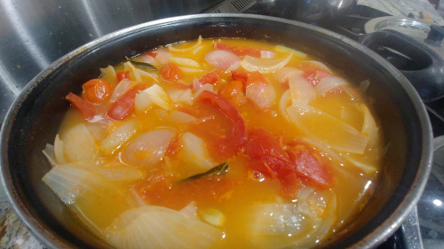 Boiled onion, tomatoes and cashews
