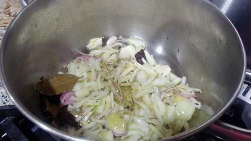 add sliced onion and ginger